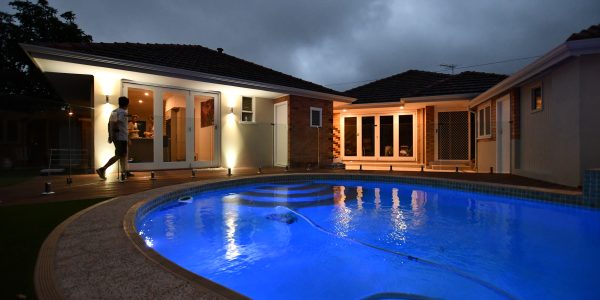 An outdoor residential space with a pool perfect for a home renovations